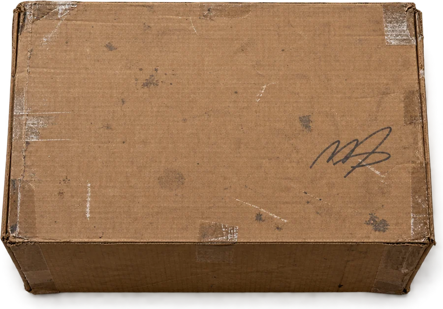 A cardboard box on the sidewalk