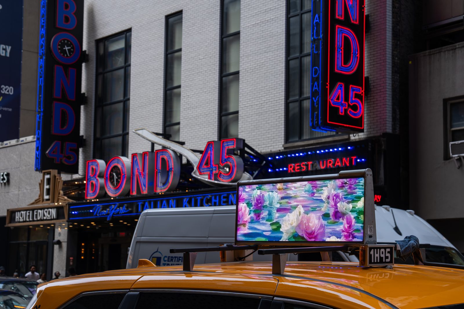 Endless Peonies on a taxi top outside Bond 45 in Times Square
